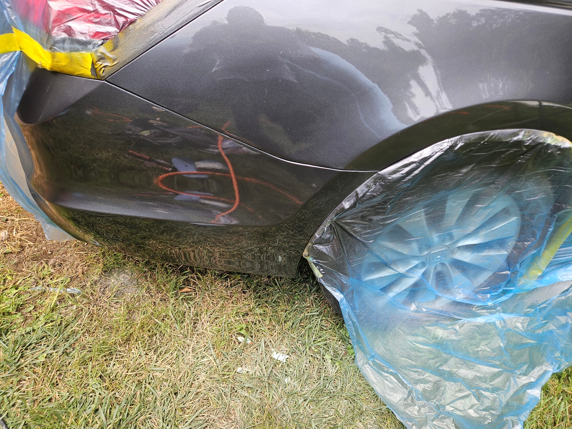 After photo of gray Honda Accord rear quarter panel and bumper repaired and refinished in factory metallic paint